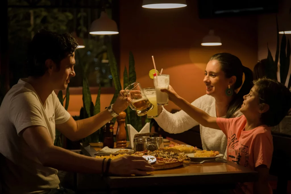 Family enjoying a meal at one of Austin's family-friendly restaurants